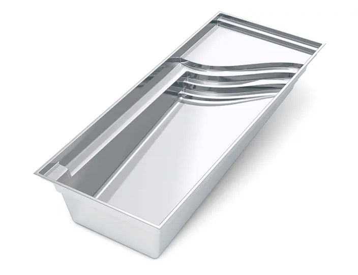The Bliss fiberglass pool by Barton Pool Company - rectangular inground pool shell with curved step entry and bench seating