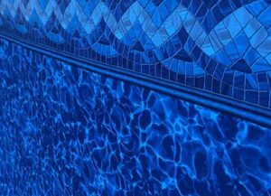 Close-up of decorative tile and liner pattern used for custom pool design options